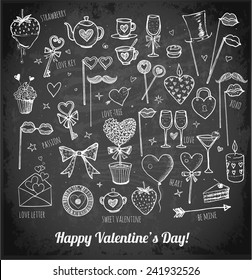 Set of hand-drawn Valentine's Day symbols in sketchy style on blackboard