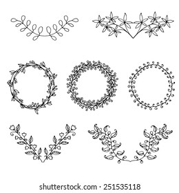 Set of hand-drawn vintage floral branches and design elements. Illustration for greeting cards, invitations, and other art projects. Vector illustration