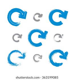 Set of hand-painted blue update signs isolated on white background, collection of simple hand-drawn repeat navigation icons. Brush drawing refresh multimedia symbols.