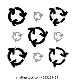 Set of hand-painted monochrome update signs isolated on white background, collection of simple hand-drawn repeat navigation icons. Brush drawing refresh multimedia symbols.