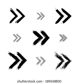 Set of hand-painted rewind signs isolated on white background, simple monochrome rewind icons created with real hand-drawn ink brush scanned and vectorized.