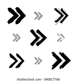 Set of hand-painted rewind signs isolated on white background, simple monochrome rewind icons created with real hand-drawn ink brush scanned and vectorized.