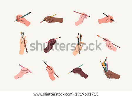 Set of hands of different skin colors holding pencil and brush. Drawing, handwriting, painting, art process with Different positions of painter's hands, fist, wrist, palm.