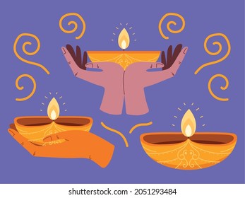 Händchen mit Diya-Lampen
