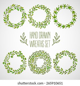 Set of hands drawn decorative wreaths. Vector illustration EPS10