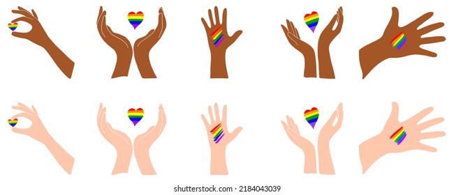 Un conjunto de manos con un corazón. Corazón arcoiris. Piel clara y oscura. LGBT.