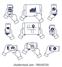Set of hands holding smartphone and tablet