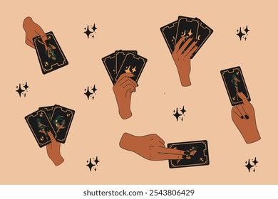 A set of hands holding tarot cards with different symbols