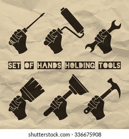 Set of hands holding tools. Vector hands holding screwdriver, paint roller, wrench, brush, hammer and plunger. Home renovation labels. Vector illustration on vintage paper background.