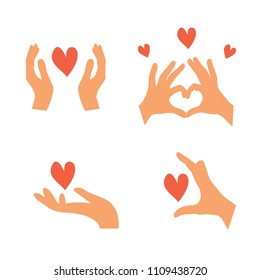 Set of hands with red hearts