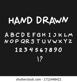 Conjunto de letras latinas manuscritas. Fuente cómica vectorial. Alfabeto blanco aislado en fondo negro.