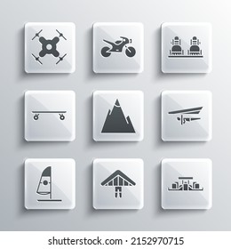 Set Hang glider, Formula 1 racing car, Mountains, Windsurfing, Longboard skateboard, Drone flying and Snowboard icon. Vector