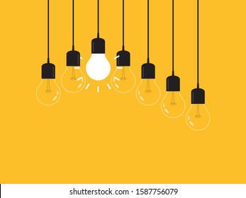 Set of hanging light bulbs with one glowing. Leadership, power and uniqueness concept.