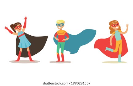 Set of Happy Boys and Girls in Superhero Costumes, Super Kids Dressed Capes and Masks Having Fun at Masquerade Party Cartoon Vector Illustration