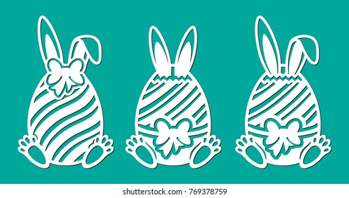 Set of Happy Easter eggs with bow, line, ears and paws of rabbit. Laser cutting template. Vector sample elements. Silhouette illustration isolated on green spring background.