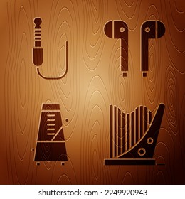Set Harp, Audio jack, Metronome with pendulum in motion and Air headphones on wooden background. Vector