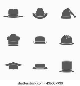 Set of hats monochrome icons. Safety helmet, bowler, top hat, graduation cap, chef, gangster, tourist, cowboy and Santa Claus hats. Vector illustration.