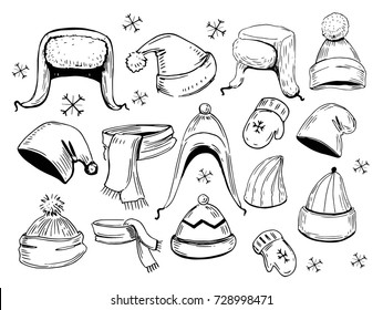 Set of hats, scarves, mittens. Hand drawn illustration converted to vector