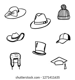 Set of hats. Vector cartoon doodles. Isolated objects on a white background. Hand-drawn style.