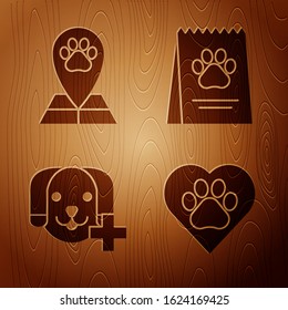 Set Heart with animals footprint, Map pointer with veterinary medicine hospital, Veterinary clinic symbol and Bag of food for dog on wooden background. Vector