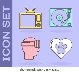 Set Heart with animals footprint, Television, Virtual reality glasses and Vinyl player with a vinyl disk icon. Vector