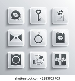 Set Heart in hand, Gift box, Calendar with heart, Wedding rings, Condom package, Envelope Valentine, speech bubble and Shopping bag icon. Vector