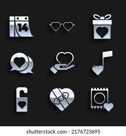 Set Heart on hand, Candy in heart shaped box, Condom package, Music note, tone with hearts, Please disturb, speech bubble, Gift and Calendar February 14 icon. Vector