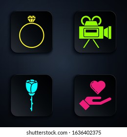 Set Heart on hand, Diamond engagement ring, Flower rose and Cinema camera. Black square button. Vector