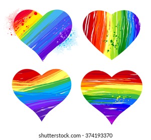 Set of hearts painted rainbow paint on white background.