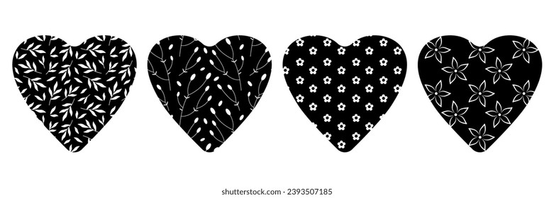 Set of hearts with plant elements. Vector illustration. Black and white silhouettes of hearts with flower pattern. Symbols of love.