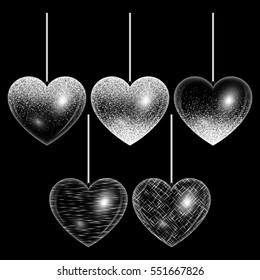 Set of hearts with shimmering lights. Particles abstract on a dark backdrop.

