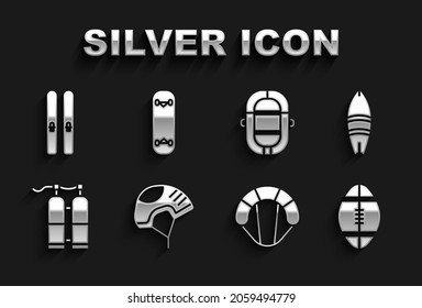 Set Helmet, Surfboard, Rugby ball, Parachute, Aqualung, Rafting boat, Ski and sticks and Skateboard trick icon. Vector