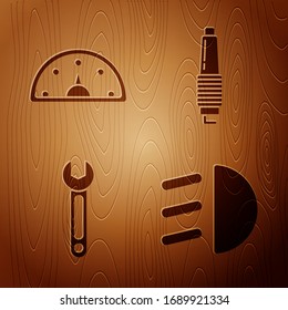 Set High beam, Speedometer, Wrench and Car spark plug on wooden background. Vector