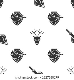 Set Hipster arrow tip, Deer head with antlers and Flying duck on shield on seamless pattern. Vector