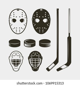 set of hockey equipment and gear. helmet, mask and puck. sport design elements for logotypes and emblems. vector illustration