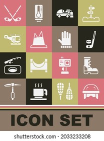 Set Hockey helmet, Waterproof rubber boot, Ice hockey stick and puck, resurfacer, Mountains, Rescue helicopter, sticks and Christmas mitten icon. Vector