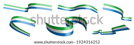 Set of holiday ribbons. Flag of Republic of Sierra Leone waving in wind. Separation into lower and upper layers. Design element. Vector on white background