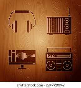 Set Home stereo with two speakers, Headphones, Sound or audio recorder on monitor and Radio with antenna on wooden background. Vector