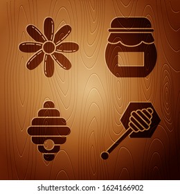 Set Honey dipper stick, Flower, Hive for bees and Jar of honey on wooden background. Vector