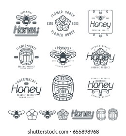 Set of honey labels, badges and design elements. Black print on white background