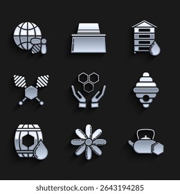 Set Honeycomb and hands, Flower, Tea kettle with honey, Hive for bees, Wooden barrel, dipper stick,  and map of the world icon. Vector