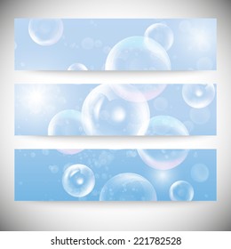 Set of horizontal banners. Drops in the blue water vector background.