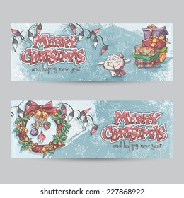 Set of horizontal Christmas banners with the image of a lamb, gifts and wreaths