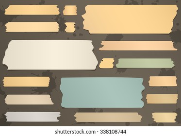 Set of horizontal and different size sticky tape, adhesive pieces on brown background
