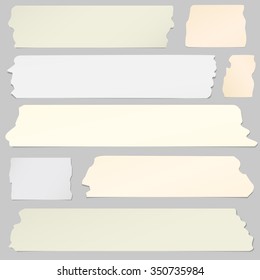 Set of horizontal and different size sticky tape, adhesive pieces on gray background