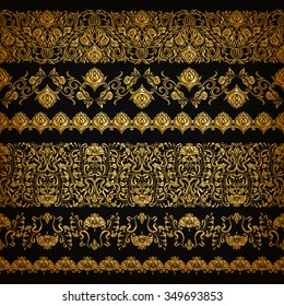 Set of horizontal golden lace pattern, decorative elements, borders for design. Seamless hand-drawn floral ornament on black background. Page, web site decoration. Vector illustration EPS 10.