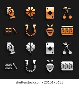 Set Horseshoe, Casino slot machine with cherry, Slot lucky sevens, strawberry, chips, Playing card spades, Hand holding playing cards and clover icon. Vector