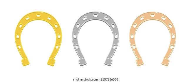 Set of horseshoes made of different metals. Gold, silver, copper horseshoe.