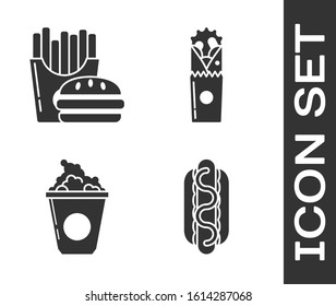 Set Hotdog sandwich with mustard, Burger and french fries in carton package box, Popcorn in cardboard box and Doner kebab icon. Vector