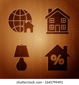 Set House with percant discount tag, Globe with house symbol, Table lamp and Home symbol on wooden background. Vector